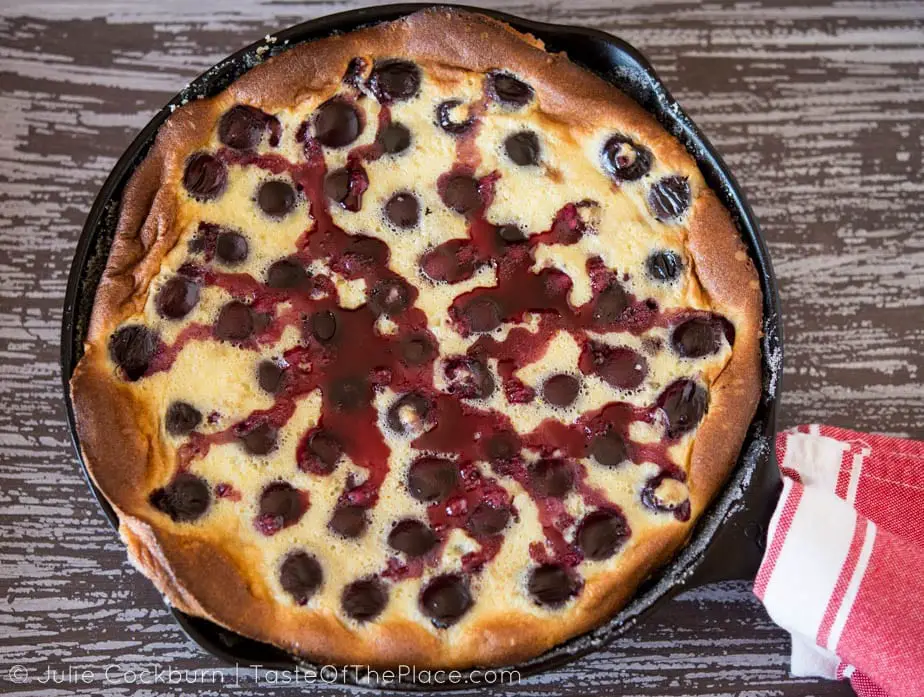Cherry clafoutis out of oven _TasteOfThePlace.com