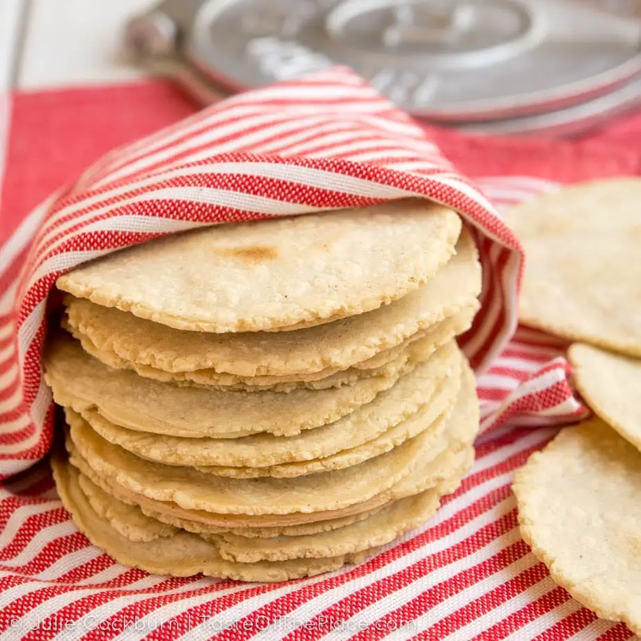 Homemade, authentic corn tortillas are surprisingly easy to make, contain only 3 ingredients, and taste sooo much better than store-bought! They’re tender, fresh, moist, pliable, and have a delicious corn flavor. Try out this simple recipe for your next taco night, and enjoy the authentic flavors of Mexico!