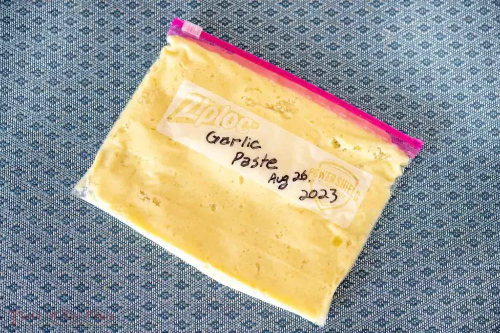 Garlic paste ready for freezing in a zip-top bag